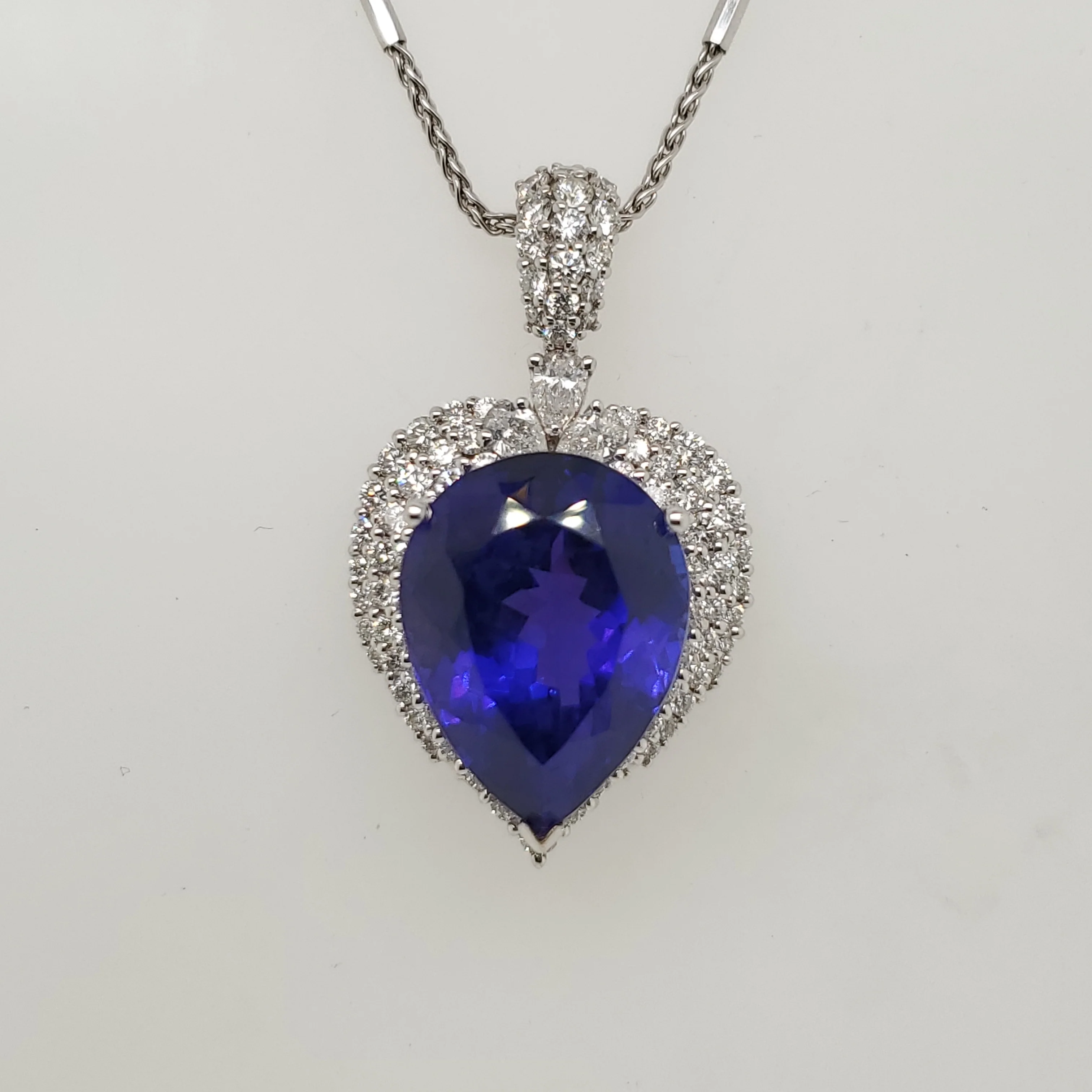 14kt White Gold 24.48 Carat Pear Shaped Tanzanite Pendant With Diamonds
