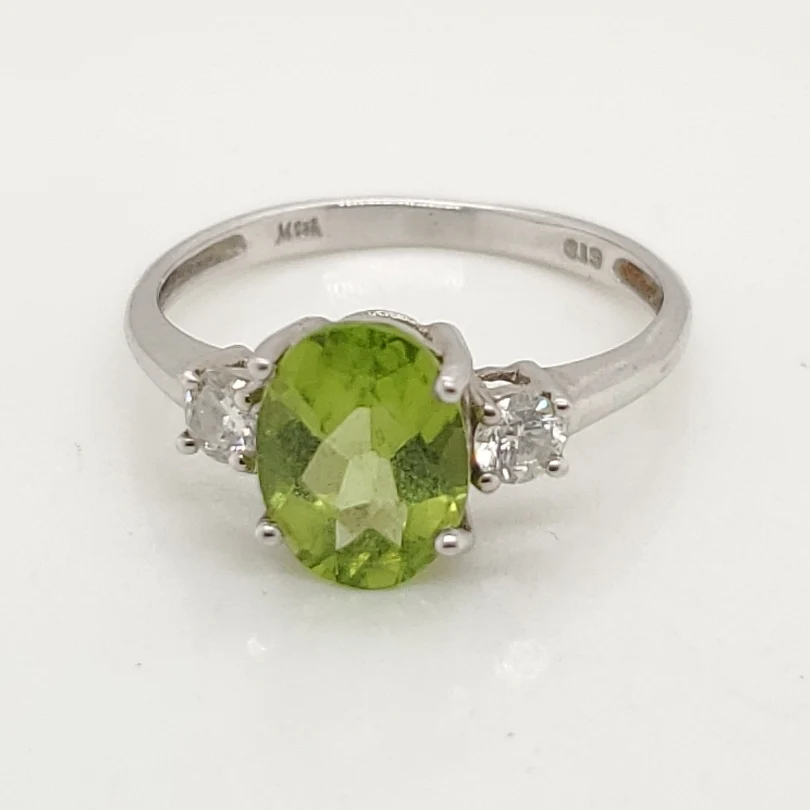 14Kt White Gold  Oval Peridot And Diamond Ring