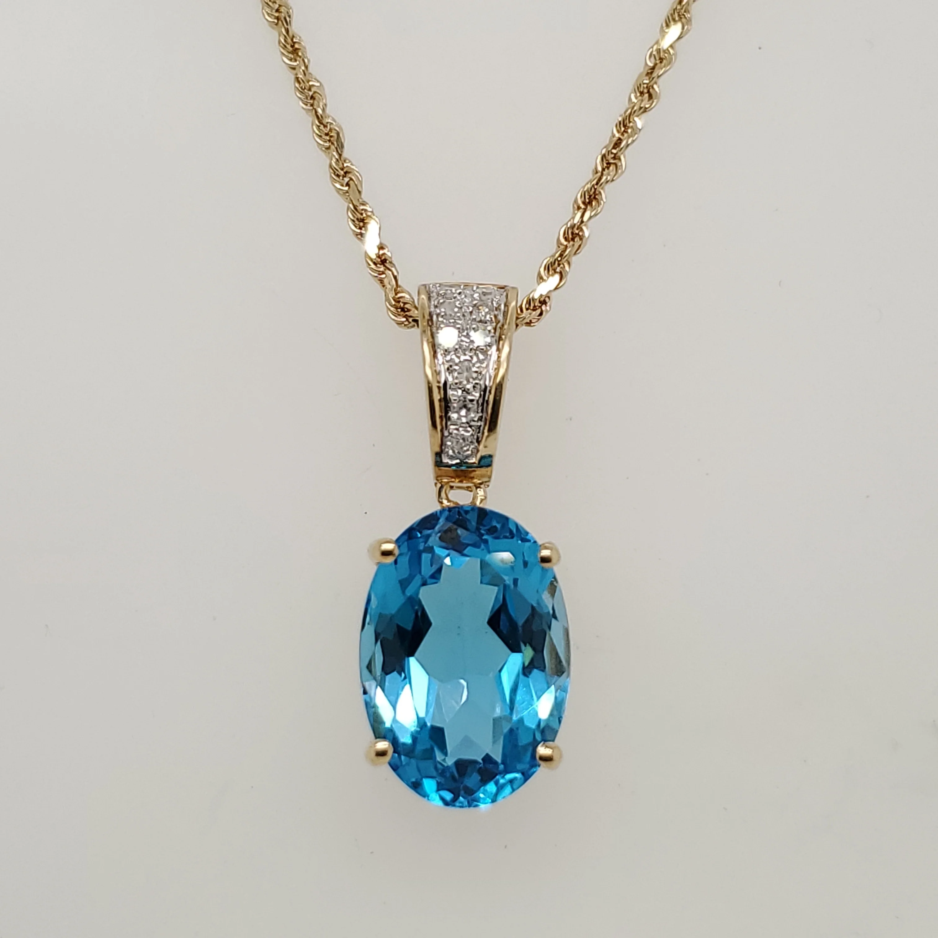 14kt Yellow Gold Blue Topaz and Diamond Pendant