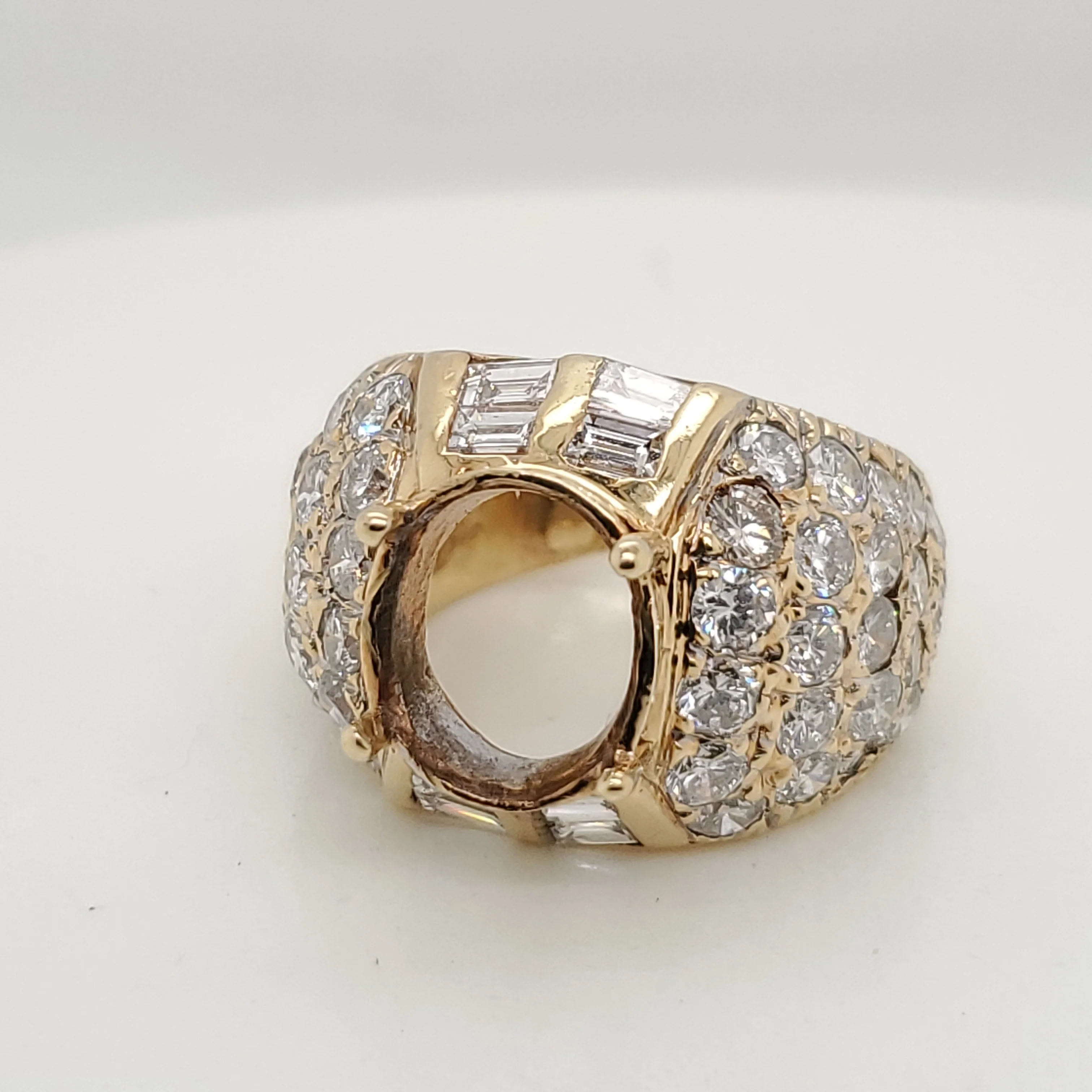 18kt Yellow Gold 3.55 Carat Oval Emerald and Diamond Ring