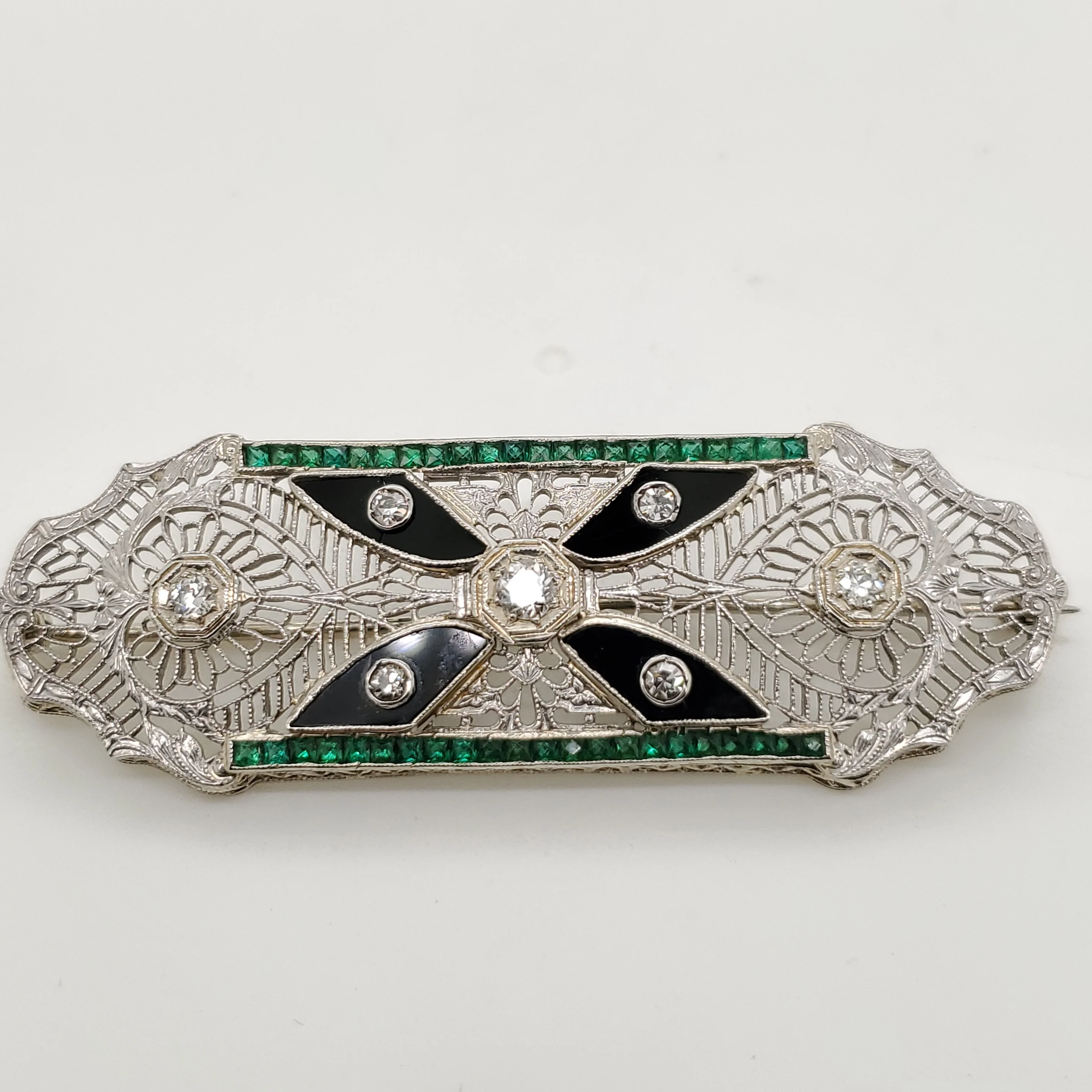 Art Deco 14kt White Gold Filigree Diamond Onyx and Tsavorite Garnet Brooch