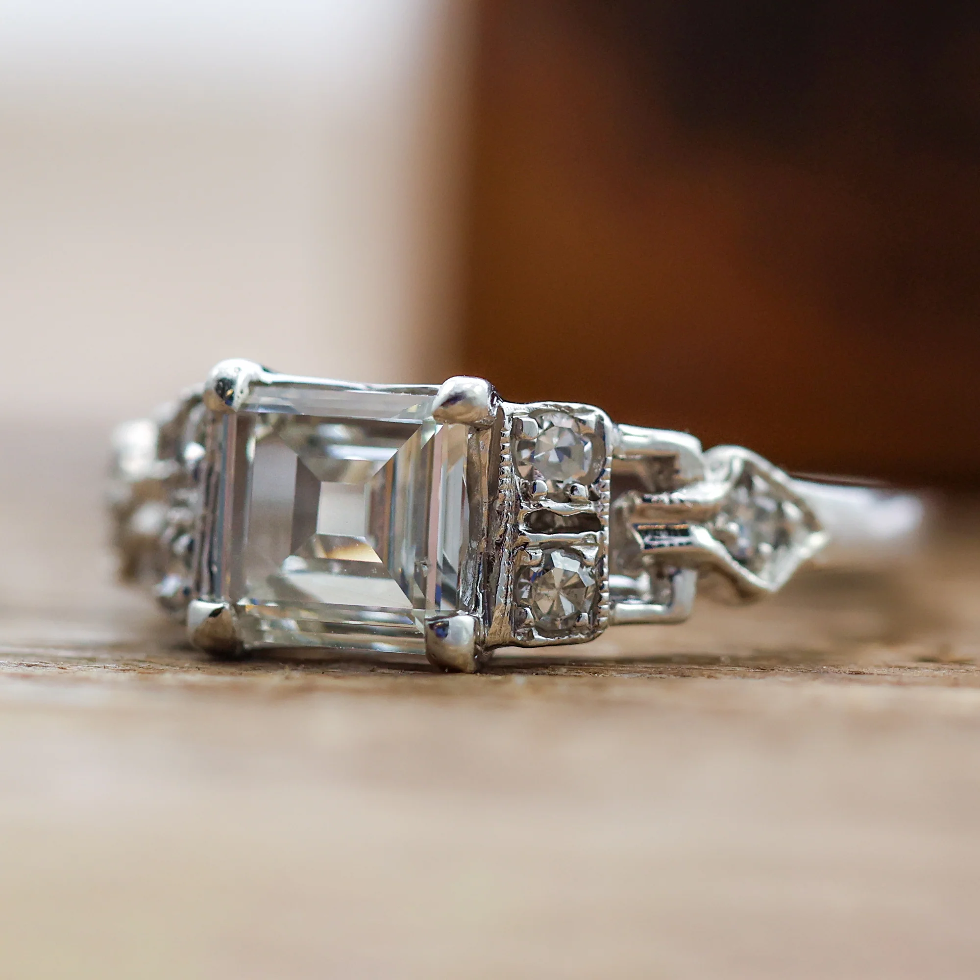 Art Deco Step Cut Diamond Set In A Platinum Millgrain Ring With Six Single Cut Diamonds. - Image 3